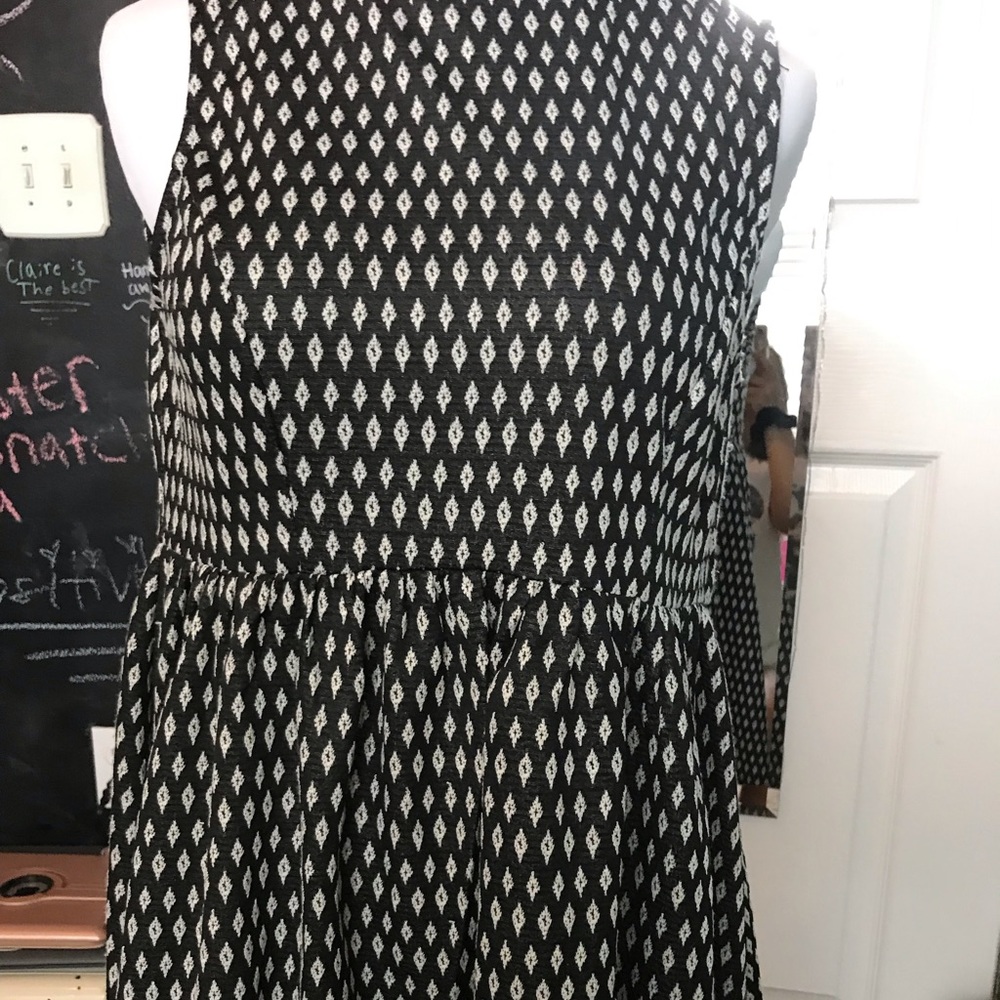 A black and white shirt sleeve dress